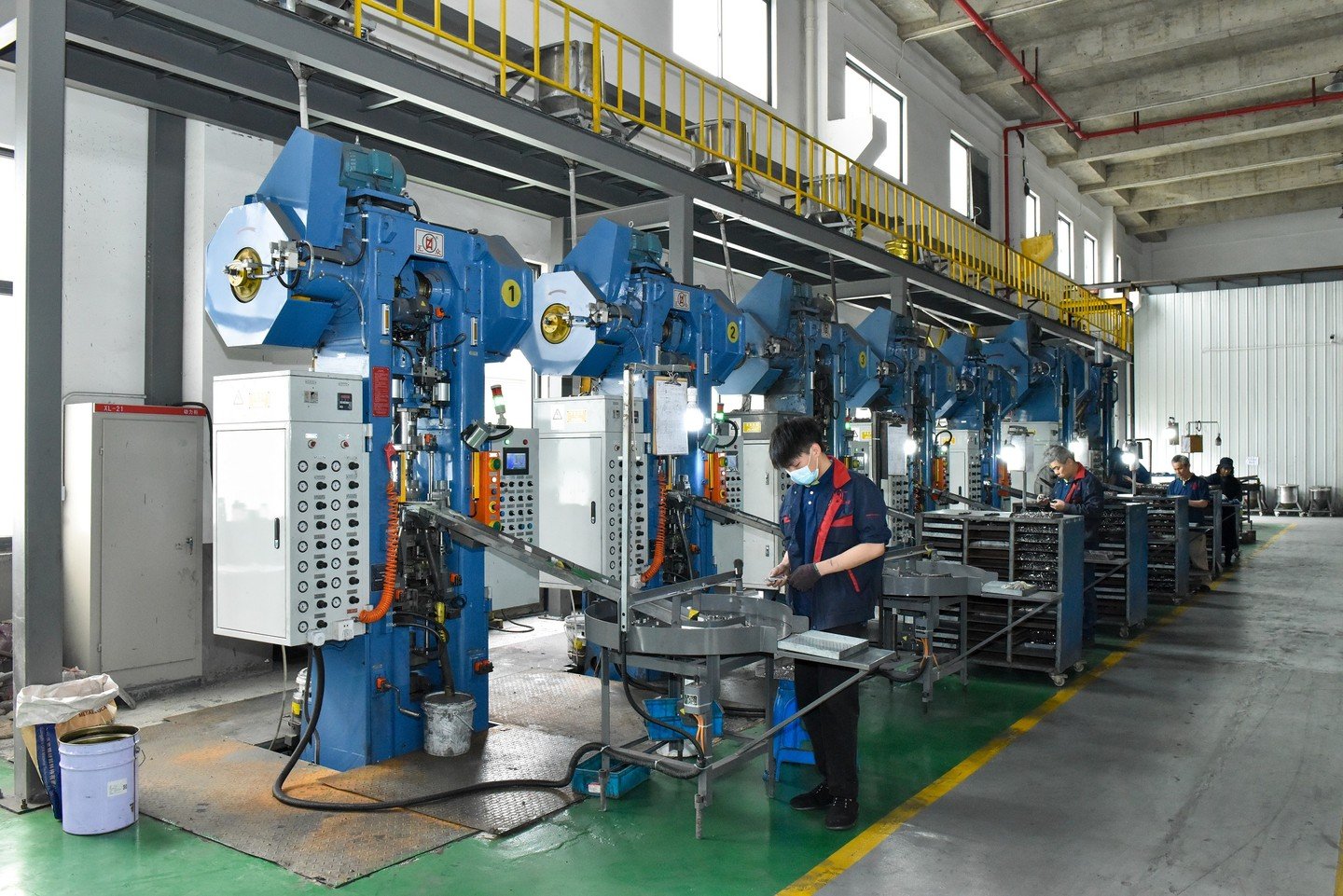 Powder metallurgy compaction press on the JH PM IATF 16949 certified production floor in Shaoxing, China