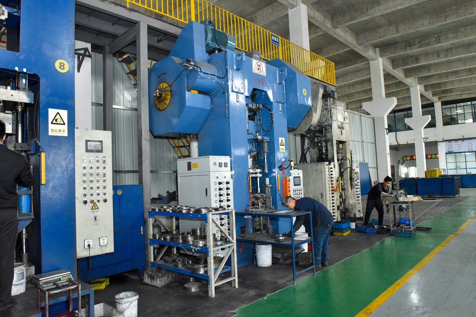 PM compaction press in production at the JH PM plant - real factory photo
